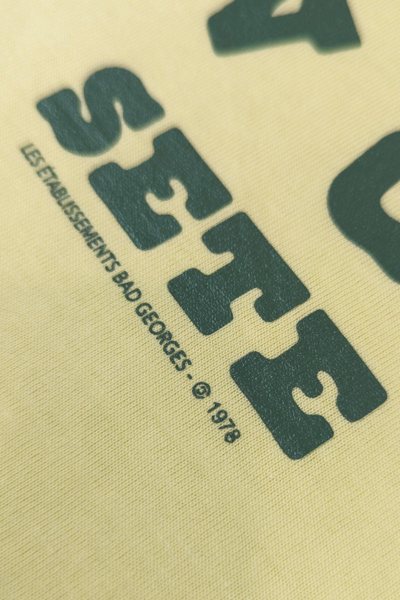 Le T-shirt FAN CLUB jaune pâle